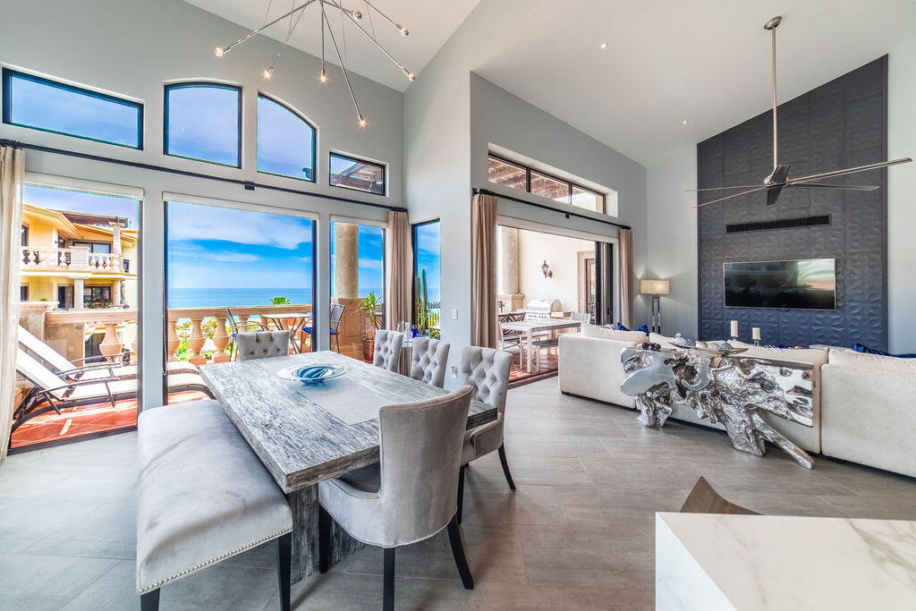 Los Cabos Puerta Del Sol-Cdsol Perched to capture sweeping ocean vistas, undoubtably THE MOST ATTRACTIVE & fully updated and remodeled 3-bedroom condo offers a rare blend of luxury, comfort, and elevated design. Vaulted ceilings create a dramatic sense of space and light, while the open-concept layout seamlessly connects the expansive living and dining areas to a generous outdoor terrace--perfect for entertaining or simply soaking in the endless blue horizon.Thoughtfully redesigned, the residence features upgraded finishes throughout, including modernized kitchen and baths, enhanced air conditioning, and high-quality doors and windows built for both style and durability. Each bedroom is well-proportioned, with the primary suite offering a private retreat complete with serene – A405 Puerta del Sol, Cabo Corridor, BS