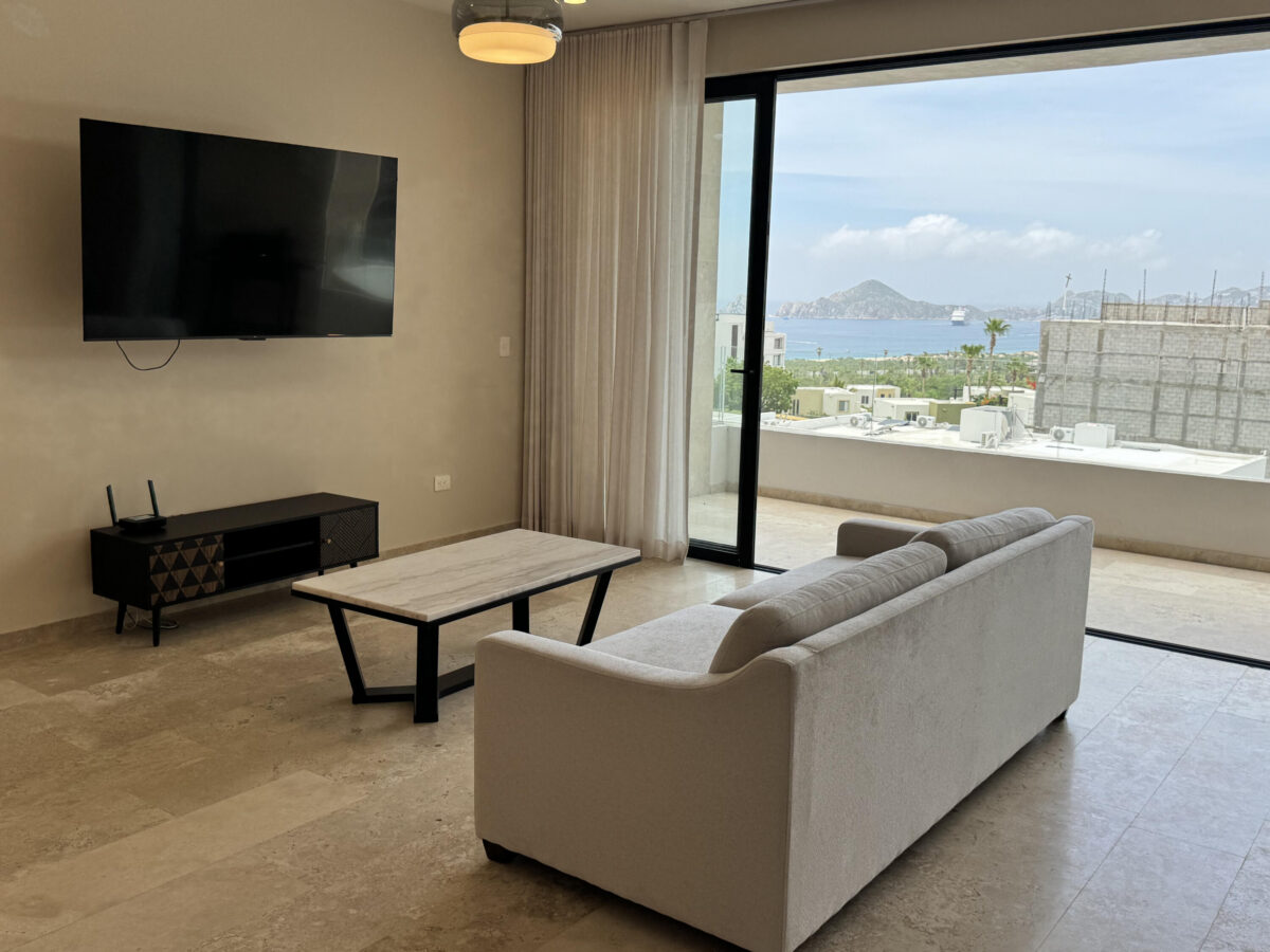 Los Cabos Cabo Costa POOL INCLUDED! This stunning 2-bedroom condo with huge deck is located on the first level in the Balandra Tower of Cabo Costa . Cabo Costa is the newest community that blends its arquitectural designs with nature. This unit has been meticulously designed and comprises two end-suite bedrooms. The property interior is designed in neutral tones to create a modern, welcoming and luxurious home yet retaining its original features. Amenities such as a Club House, Infinity pool, Gym, sundeck, Kids area, Jacuzzi, Wetbar, Snackbar & Massage area. – Vistas del Tezal 406, Cabo Corridor, Cabo Corridor, BS