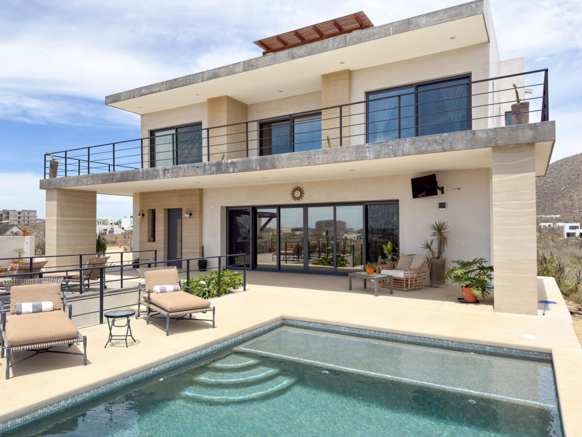 Los Cabos Blue Moon Located in the prestigious gated community of Pedregal, Villa De La Luz offers timeless Mexican Hacienda architecture combined with spacious living and exceptional comfort.This beautifully designed residence features expansive indoor and outdoor areas, ideal for both full-time living and entertaining. Bright interiors flow seamlessly to generous terraces, creating the perfect setting to enjoy Cabo's lifestyle.The home offers 6 en-suite bedrooms, a fully equipped kitchen, and thoughtfully designed living spaces. Outdoor amenities include a private swimming pool, jacuzzi, and BBQ area, providing an ideal environment for relaxation and gatherings.Include a two-car garage, ample storage, and access to Pedregal's exclusive amenities, including 24/7 security, beach and green areas. – 30 Cam. Grande, Cabo San Lucas, BS